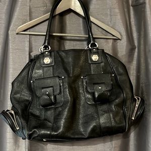 Like new Maxx New York Leather Purse. Comes with dust bag.